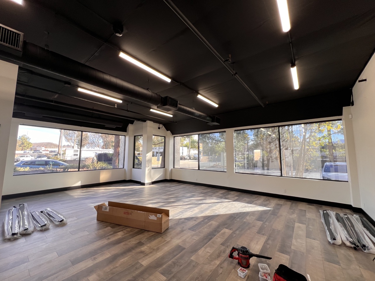 Before: the same commercial office with bare windows on install day